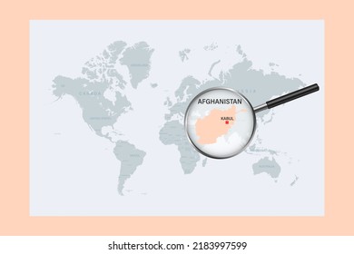 Map of Afghanistan on political world map with magnifying glass