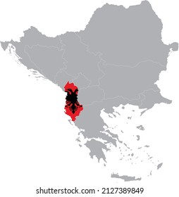 Map of Albania with national flag within the gray map of Balkan peninsula