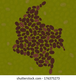 Map of  Colombia made out of coffee beans. Raw green coffee beans background.