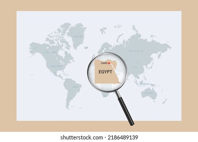 Map of Egypt on political world map with magnifying glass