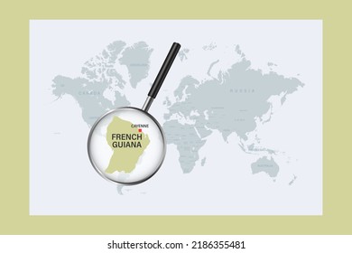 Map of French Guiana on political world map with magnifying glass