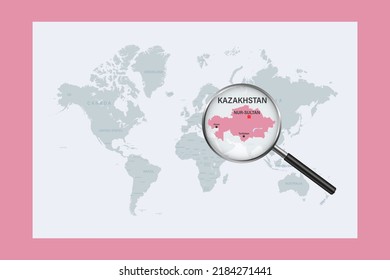 Map of Kazakhstan on political world map with magnifying glass