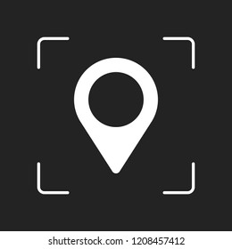 Map label icon. White object in camera autofocus on dark background