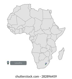 Map of Lesotho with an official flag. Location on the continent of Africa
