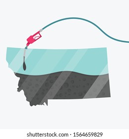 Map Montana, in USA, being fueled by oil. Gas pump fueled map. On the map there is glass reflection. American state. Conceptual. Oil producing or importing regions.