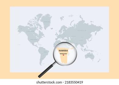 Map of Namibia on political world map with magnifying glass