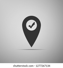 Map pointer with check mark icon isolated on grey background. Marker location sign. Tick symbol. For location maps. Sign for navigation. Flat design. Vector Illustration