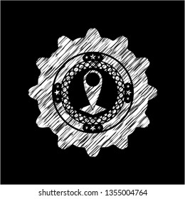 map pointer icon inside chalkboard emblem