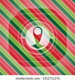 map pointer icon inside christmas badge.