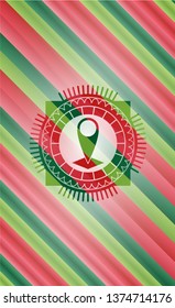 map pointer icon inside christmas badge.