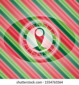map pointer icon inside christmas style emblem.