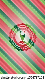 map pointer icon inside christmas colors style badge.