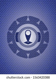 map pointer icon inside emblem with denim texture