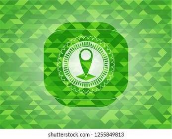 map pointer icon inside green mosaic emblem