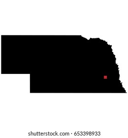 Map silhouette of state of Nebraska with capital city