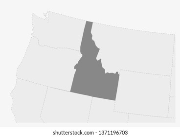 Map of USA with highlighted Idaho map, gray map of US State Idaho with neighboring countries