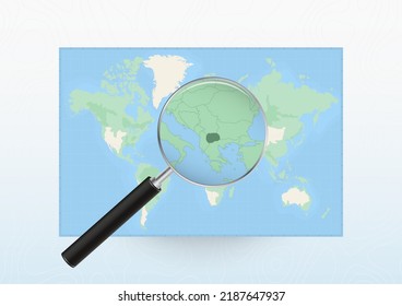 Map of the World with a magnifying glass aimed at Macedonia, searching Macedonia with loupe. Vector map.