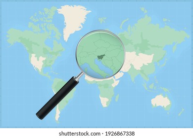 Map of the world with a magnifying glass on a map of Slovenia Detailed map of Slovenia and neighboring countries in the magnifying glass.