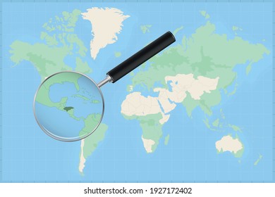 Map of the world with a magnifying glass on a map of Honduras Detailed map of Honduras and neighboring countries in the magnifying glass.