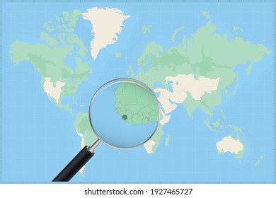 Map of the world with a magnifying glass on a map of Sierra Leone Detailed map of Sierra Leone and neighboring countries in the magnifying glass.