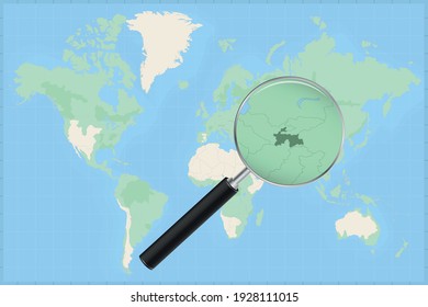 Map of the world with a magnifying glass on a map of Tajikistan Detailed map of Tajikistan and neighboring countries in the magnifying glass.