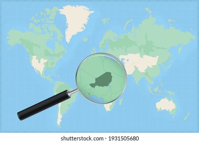 Map of the world with a magnifying glass on a map of Niger Detailed map of Niger and neighboring countries in the magnifying glass.
