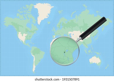 Map of the world with a magnifying glass on a map of Burundi Detailed map of Burundi and neighboring countries in the magnifying glass.