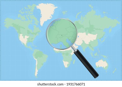 Map of the world with a magnifying glass on a map of Liechtenstein Detailed map of Liechtenstein and neighboring countries in the magnifying glass.