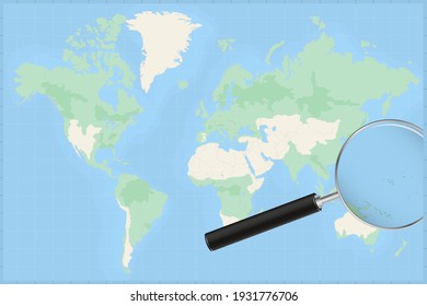 Map of the world with a magnifying glass on a map of Marshall Islands Detailed map of Marshall Islands and neighboring countries in the magnifying glass.