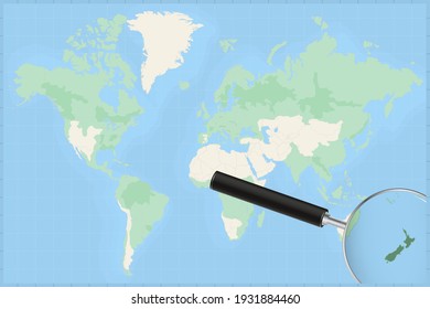 Map of the world with a magnifying glass on a map of New Zealand Detailed map of New Zealand and neighboring countries in the magnifying glass.