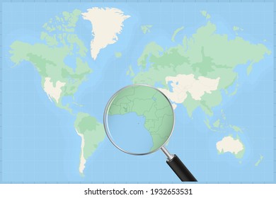 Map of the world with a magnifying glass on a map of Sao Tome and Principe Detailed map of Sao Tome and Principe and neighboring countries in the magnifying glass.