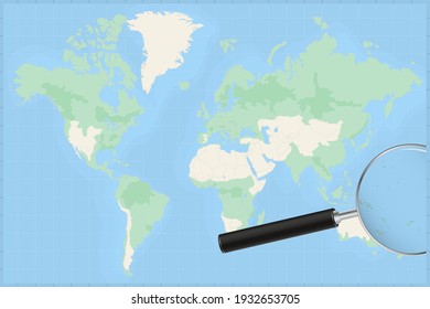 Map of the world with a magnifying glass on a map of Tuvalu Detailed map of Tuvalu and neighboring countries in the magnifying glass.