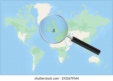 Map of the world with a magnifying glass on a map of Wales Detailed map of Wales and neighboring countries in the magnifying glass.