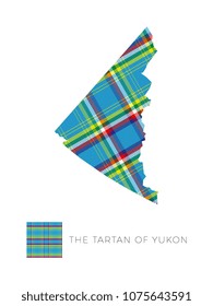 map of yukon territory in canada filled with pattern of regional tartan and fragment of it on white background