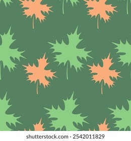 Maple leaf. Repeating vector pattern. Flat style. Isolated green background. Continuous ornament of orange and green leaves. The shape of the leaf is crown-shaped. Idea for web design.