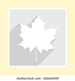 Maple leaf silhouette on greeting card.