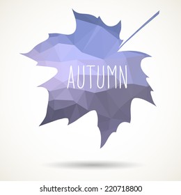 Maple leaf in triangular style with hand drawn word 'Autumn'.