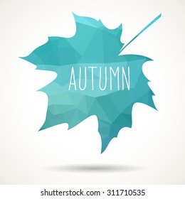 Maple leaf in triangular style with hand drawn word 'Autumn'.