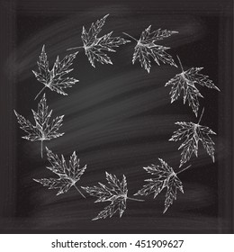 Maple leaves frame on a chalkboard background. Vector graphic.