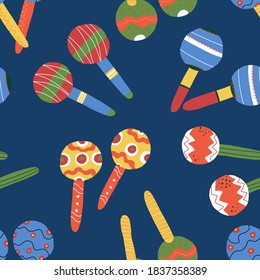 Maracas seamless vector pattern for textile, fabric, cloth print, coverage, wrapping paper and other design. Various traditional Mexican music shakers equipment on blue background.