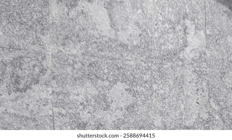 a marble ceramic tile, which mimics the natural texture of marble but is actually ceramic.