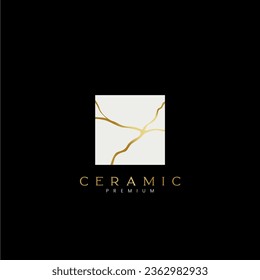 marbleized ceramic logo icon with gold artistic lines square shape in black