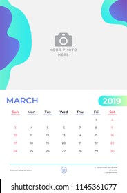 March 2019 calendar design. Simple green and purple background. Week starts on Sunday. Vector design print template with place for photo. 