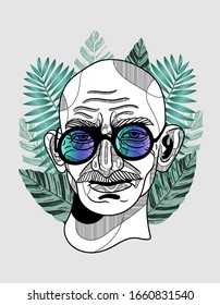 March. 3, 2020: Mohandas Karamchand Gandhi. Hipster Portrait With Glasses And Tropical Leaves. Summer Style.