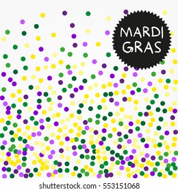 Mardi Gras confetti background. Golden, purple and green confetti for Mardi Gras.