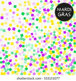 Mardi Gras confetti background. Golden, purple and green confetti for Mardi Gras.