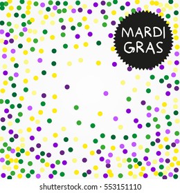 Mardi Gras confetti background. Golden, purple and green confetti for Mardi Gras.