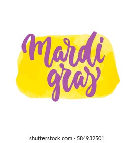 Mardi Gras - hand drawn carnival lettering phrase isolated on the white background with watercolor. Fun brush ink inscription for photo overlays, greeting card or t-shirt print, poster design