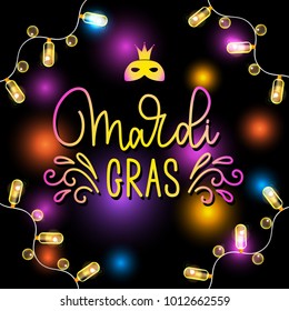 Mardi Gras hand drawn lettering and realistic luminous garlands. Greeting banner for Fat Tuesday holidays. Vector illustration EPS 10 file
