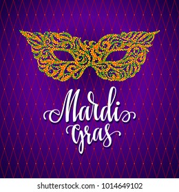 Mardi Gras lettering with carnival mask. Eps8. RGB Global colors